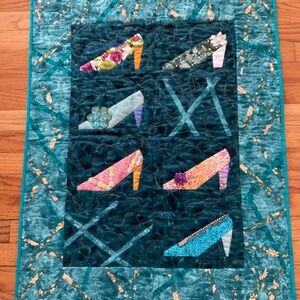 Shoe quilted wall hanging